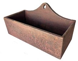 RM1480 Early 19th century New England hanging wall box with high arched back with hole for hanging. Small square head nail construction. Old dark red painted surface over the original mustard paint. Circa 1830s.