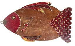 RM1496 Fish shaped cutting board with carved details for head, mouth, fins and scalloped tail. Original paint decorated areas include the eye, fins, gills and scales. Early hook in end for hanging purposes. No cracks. Great natural patina on reverse side. Measurements: 17" long x 7/8" thick x 10" tall.