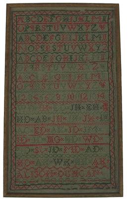 X14 Early 19th century American Sampler from Frederick Maryland, with great colors, with the Initials M.W and J.C. with a basket of flowers and two hearts and trees. Measurement are 8 7/8" x 17 7/8" long