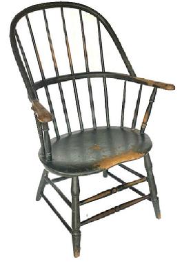Windsor sack-back arm chair retaining beautiful Windsor green painted surface. One board seat. Nice turnings.  Great wear � especially on each of the arms and seat front. Very sturdy. The chair measures 25 ¾� wide across front of arms. Seat height is 16� from floor. Overall height of chair back is 37 ½� tall