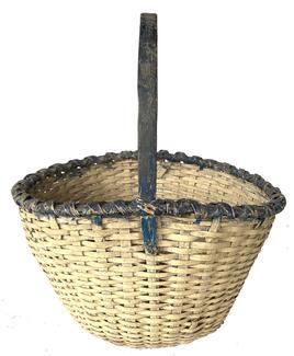 D513 Eastern Shore Maryland gathering basket with white and soldier blue paint. Overall height of the basket is 19" to top of the handle. Woven part of the basket is gracefully tapered from 9 3/5" to 11" tall where the handle is attached. Handle 