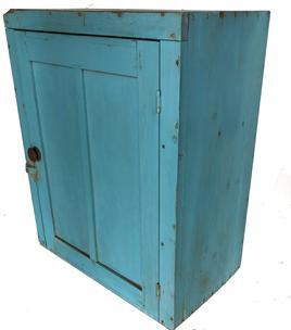 RM1036 19th century Hanging Cupboard, in original blue paint, found in New England circa 1880 a great cupboard, with the look f 19th century with double flat panel door which still retains it original iron hinges. The interior has three shelves, it is round nails construction with some square head nails