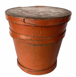 G377 Painted wooden lidded storage bucket in wonderful old pumpkin orange paint over the original blue paint. Circa 1860 - 1880. Tongue and groove constructed staves with steamed and bent wooden cross-braided finger lap bands secured with tacks.. Measurements: 8 3/4� tall, 9 1/4� diameter at lid, 7 1/8� diameter across the bottom  