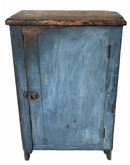 **Sold**H308 Beautiful original blue painted small one door storage cupboard with cut out feet from Center County, Pennsylvania. Unusual in that is it painted on all sides, and inside on all but the shelves. Square head nail construction.  Great wear from many years of use. Circa 1850. Measurements: 18 7/8� wide x 13 ½� deep x 28� tall