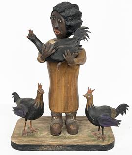 *SOLD* J311 Great piece of American hand carved wooden Folk Art depicting a black lady holding a (removeable) chicken/rooster with two chickens/roosters standing by her sides with very realistic original hand painted details throughout. Exceptional details in the carving, especially the lady�s hands, face, and hair, as well as the combs, wings, and feet of each of the chickens/roosters! The carver even included soles on the boots and real string in the lady�s bootlaces. Base measures 10 ¼� wide x 5 ½� deep. Overall height is approximately 14� tall. 