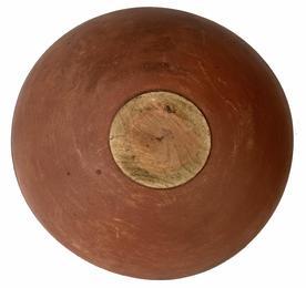 H466 - 19th Century Pennsylvania extraordinary wooden bowl in original salmon paint. Bowl boasts a chamfered interior lip with a distinct molded rim around the top outer edge and rests on an ever so slightly raised foot.