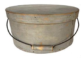 F437 19th century New England large bail handle Pantry Box in the original pewter gray paint. Ash side with pine top and bottom; clinched nail and wood-peg construction; wire bail-handle with turned wood grip.  Measurements are: 15" diameter x 7" tall