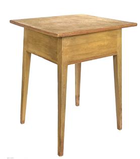 J140 Pennsylvania Hepplewhite table with old mustard painted surface over the original red paint boasting tall, gracefully tapered splay legs. Mortised and wooden pegged construction with carved reeded detailing along the bottom edge of the apron on all sides. Circa 1820s � 1850�s. One-board top. Measurements: 21 ½� x 24 ¼� x 30 ½� tall. 