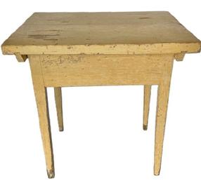L541 Late 18th to early 19th century Pennsylvania pin top worktable with an extra thick one-board top and mortised and pegged apron resting on sturdy, gradually tapered legs bearing its original creamy yellow painted surface.