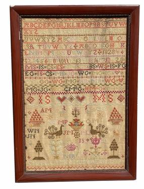 G353 Exquisite Family sampler wrought by �Charlotte Smith, FEB 1829� This remarkable Sampler features two dates (1828 and 1829), bands with four full sets of repeating Alphabets, a band of numbers 1 - 20, as well as spot motifs that include multiple hearts, flowers, a very detailed cat, bowl of fruit, chickens, peacocks, trees, a crown.... and an astounding 46 sets of initials! Intricately stitched dividing lines separate the bands and a zig-zag border adorns to top and bottom of the work.  Measurements: 17� wide x 24� tall. Wooden frame is 1 1/2� wide.