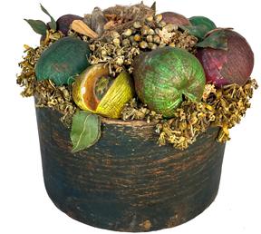 *SOLD* G635 Original vintage floral arrangement by folk artist, Doris Stauble (1917-2007) of Wisscesset, Maine, done in an original blue painted thick walled Measure/Pantry Box. Arrangement consists of many varieties of faux fruit (some wedged) that are tightly arranged with various types of artificial flowers/greenery and topped with a bird nest hosting a small bird that measures 3 1/4� long x 1/4� wide. Wooden Measure/Pantry Box is 9 1/8� diameter x 5 1/4� tall. Overall height is approximately 8� tall. 