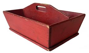 J353 19th century Pennsylvania original Tomato Red painted Cutlery tray / knife box with curved center divider featuring an oval cutout for carrying purposes. Nicely canted sides. Wire nail construction. Circa 1880s. Very dry surface with wear indicative of use. Measurements: 11 ¼� x 8 1/2� across top. 10 5/8� x 7 1/2� across bottom. 5� tall (center).  The sides are 3 5/8� tall. 