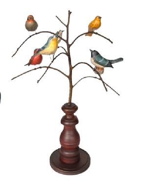 **SOLD** L14 Handmade 20th Century Folk Art Bird Tree with seven different, beautifully hand carved and vibrantly painted wooden Songbirds resting on steamed and bent branches. Mounted in a tapered wooden turned base for display purposes. Signed, and branded on bottom, "Ken Kirby".  Approximate measurements: 7 bottom diameter x ~17 across widest limbs x 24 tall. Each bird measures approximately 4 ¾ long x ~2 wide x ~2  2 ½ tall.  