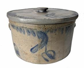 H246 Cobalt decorated lidded Stoneware Cake Crock with applied handles. Pennsylvania, circa 1860s. Lid is also beautifully decorated with cobalt around the edge. The Lid and Crock are in very good condition. Measurements: Bottom is 9 3/4' diameter x 5 1/4" tall. Lid is 10" diameter across top.