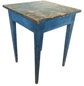H314 Early 19th century Pennsylvania Hepplewhite table retaining its original dry, blue painted surface. Table boasts long, tapered legs with a mortised apron and a one board top is secured with square head nails. Small repair to top - where a knot once was - appears to have been done when the table was first made. Measurements: 23" wide x 23" deep x 29 3/4" tall