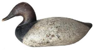 G687 Canvasback decoy carved by John Graham of Charlestown, MD cleaned to the original paint. Branded '3' on bottom. Retains original ring and weight on bottom. Working condition with visible evidence of being shot over.
