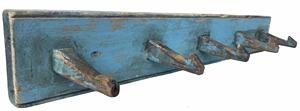 G315 19th Century wooden peg rack in the original light blue paint featuring five wooden pegs and a beaded edge along the top and bottom of the board. Wear and patina indicative of use, with the most wear being visible on the far left peg. Measurements:  22" long x 3 1/4" tall x 4 1/2" deep (at pegs)