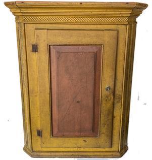 *SOLD* G427 Late 18th century Lancaster Pennsylvania double raised panel, hanging Corner Cupboard in the original yellow and salmon paint. Very unusual design, having reeded styles as well as reeded molding under the cornice molding, to include a three-step molding on top.