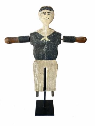 **SOLD** G761 Folk Art wooden, block cut style Sailor whirligig featuring original blue and white painted uniform complete with broad white collar a small white anchor on front of the uniform, applied black painted wooden boots, hand painted hair and facial details add distinct charm to this piece, s. Great piece of Nautical Folk Art!  Measurements: 11 5/8" tall x 9 1/2" wide across the moving arms x 1 1/4" deep (at feet)