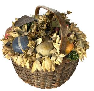 F600 Doris Stauble still life arrangement in an antique wooden basket. Measurements: 10" tall x 11� diameter. Small break to handle of basket, but does not go all the way through the handle. Artist: Doris Stauble (1917-2007) was an Antiques Dealer in Wiscasset, Maine
