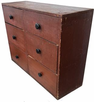 H384 Mid 19th century New England apothecary chest in original dry red paint with six large drawers. Square head nail construction