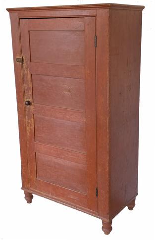 G396 Early 19th century Lancaster County original red painted single door Cupboard, Circa 1825, in the original red paint. A few of the wonderful details on this cupboard include a wide, four-panel door with a dovetailed case, tall raised turned feet, chamfered edges on front corners, one-board sides, nicely beaded edge around the door and applied  molding around the top. Clean interior boasts four sturdy shelves.  Outstanding condition, all original.    Measurements are 35 1/4" wide x 63" tall x 18 1/2" deep