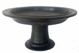 H527 18th century wooden turned compote. The original dry black painted surface is just wonderful. Notice the shaped stem. It is beautifully turned with decorative incised rings in various locations to add visual appeal. Measurements: 17" diameter x 9 3/8" tall. The lip around the top opening is 1 ½�.