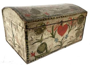 J410 19th century Pennsylvania Folk Art paint decorated domed top Bride's Box bearing a large red painted heart on the front panel and an overall Pennsylvania Dutch-style floral motif in black, green, blue and red on a white background. Clean, natural patina interior. Original hardware includes wire snipe hinges and wire latch. Good condition with wear indicative of age and use. Small wire nail construction. Circa 1830�s � 1840�s. Measurements: 17 ¾� wide x 12� deep x 9 7/8� tall.