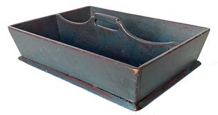 RM1305 19th century Pennsylvania Cutlery tray / knife box with canted sides and slightly raised, delicate cut out handle in fabulous old blue paint over the original red paint.  Tiny square head nail construction. Great surface condition. Measurements: 14 ¼� long x 10 ½� wide. The sides are 3 ¼� tall.  
