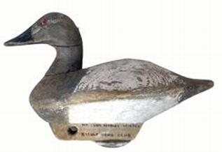 E373 Early Canvasback Hen with very unusual hand-chopped body and wooden keel with iron weight. Glass eyes. Tight crack to the neck. Circa 1940�s � Bishop Head Club - Maker unknown.