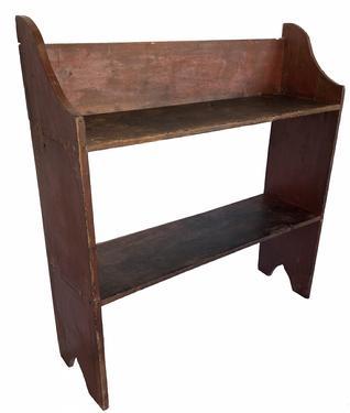 **SOLD** G89 Early 19th century Berks County Pennsylvania Bucket bench in the original dry red paint, the shelves are mortised throught the ends, with height shaped sides cut out feet
