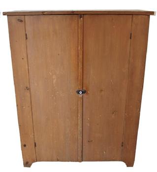 C399 19th century Pennslyvania two door storage Cupboard from Mount Joy Pa. circa 1850 with the original numeg paint, with a nice cut out foot