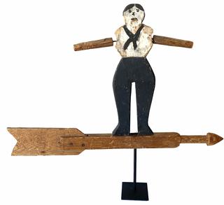 **SOLD** G760 Folk Art wooden block-cut style Sailor whirligig mounted on a hand carved wooden arrow directional. The Arrow is all natural patina, the Sailor features an original black and white hand painted uniform and  hair/facial details