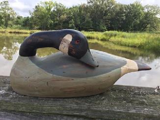 D402 Canada Goose carved by Richard Connelly 1988 well carved with a removerable head that can be reposition into a slepper or a hissing Goose