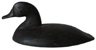 C131 Rare cast iron canvasback sink box decoy, from Chesapeake Bay origin. Great dark  surface with traces of original paint showing thru, attributed to Dye family.   13"long 