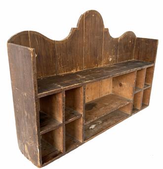 **SOLD** H503 Early 19th century Pennsylvania hanging wall shelf with decoratively cut out scalloped back and divided shelves retaining its original paint decorated surface. The bottom is dovetailed. Top shelf is mortised through the ends. The wood is pine. Measurements: 39� wide x 7 ¾� deep x 26 ¾� tall (center of back). The side boards are 20 ½� tall.