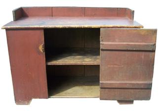 W280 18th Century New England  Cupboard base , with original dry red paint, all rose head nails construction, circa 1770 Measurements are: 22" deep x 50" wide 36 1/4" tall