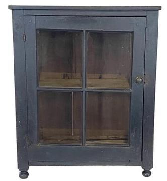 *SOLD* G905 Late 18th century Pennsylvania tabletop Cupboard, in early old black paint featuring a single door with four original wavy window lights, resting on a simple turned ball foot. The door is full mortised and pinned, the interior has a single shelf mortised into the panel.