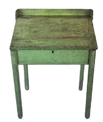 **SOLD** K1805 Mid 19th century Eastern Shore, Maryland Desk bearing its original apple green painted surface. Desk features a slanted lift lid with applied gallery resting on tall, hand-planed octagon shaped legs. The wood is pine. Square head nail construction. Circa 1860s.Measurements: 28 ¾ wide x 20 ½ deep x 37 tall (back) x 28 ½ tall (front). Apron to floor is 22 ¼.  