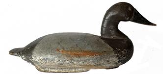 J329 Upper Susquehanna Flats Canvasback Hen decoy with original iron keel weight, leather rigging and a Pennsylvania Owner / Rig Tag intact on bottom. Decoy features a paddle-style tail with tack eyes. Unknown carver. Circa 1890 � 1910. 