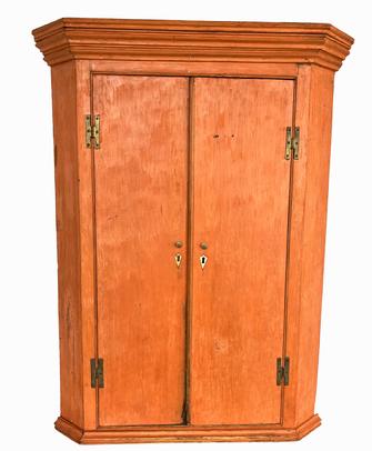 J297 Spectacular 18th century Pennsylvania original vibrant pumpkin painted hanging corner cupboard with original Windsor Green painted interior and three interior drawers. Beautiful, applied molding around the top and bottom, beaded edging around the doors and original �H� hinges. Interior shelves boast plate grooves for display purposes. Inlaid bone escutcheons surround the keyholes on doors. �T� nail construction. The wood is pine. Measurements: 46 ½� tall. Top molding area takes a 24� corner, case area takes a 21 ¾� corner. 