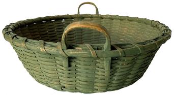 G828  Late 19th century Beautiful shallow utility basket in original green paint.  Tightly woven, double handled round design with two attached notched handles, canted sides with single wrapped rim and a dramatic pushed up bottom.  -  Great condition. Measurements: 13 1/2" diameter x 3 3/4" tall