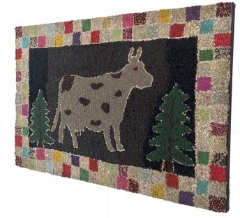 F127 19th century beautiful hand hooked rug depicting a folky cow standing between two evergreen trees on a black background. The rug�s 4� border consists of a double-row checkerboard of many colors. Constructed of several types of fibers hooked into burlap. It has been professionally cleaned and mounted on frame that is ready for hanging. Measurements are 41" wide x 22" tall
