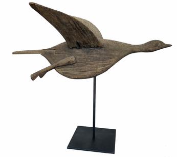 **SOLD** G692 Early Flying Goose carved wooden Weathervane on a custom made stand. Exceptional original condition with great natural weathered surface. The tail is mortised into the body, and both legs are individually attached to the body. Just a great piece of American Folk Art. Found off the Cape of Massachusetts. Circa 1930-1940s. Measures 20 1/4" long x 13 1/4" wingspan.  Overall height on stand is 17 1/4" to tip of wings.