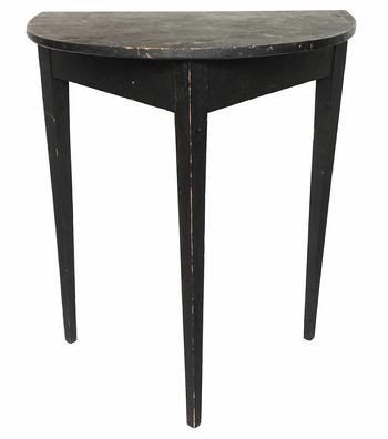 G540 Mid 19th Century wonderful one board top black painted Demi-lune table with three gracefully tapered legs circa 1840. The wood is all white pine, with square head nail construction. The apron boards are mortised into the legs for strength. Circa 1840 - 1860. Measurements: 25 1/2� wide x 17 1/4� deep x 30 1/2� tall  