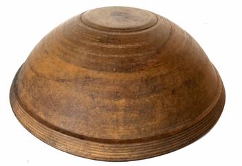 H47 19th Century extraordinary lathe turned wooden bowl with a wide molded rim. It exhibits the BEST in form, paint and condition! From Maine. Beautiful mustard paint. Out of round.  Measurements: 18 1/2" diameter x 5 1/8" deep