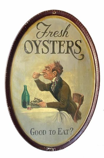 G803 Trade Sign Advertising Fresh Oysters- Good to Eat?  painted on board with an applied molding, which has been notched and bent to fit the oval sign. Great artwork on the Gentlemen, he is enjoying a plate of Oysters. The colors are great. The sign is all original. Measurements: 36" long x 24" wide x 2" deep 