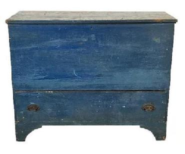 **SOLD** L100 Early 19th century New England chest over drawer / mule chest bearing original blue painted surface. Dovetailed drawer with original hardware. One board sides and front with a two board back resting on cut out feet. The wood is pine.  Clean, natural patina interior.  Circa 1820.  Measurements: 43� wide x 19 &frac14;� deep x 34� tall.  
