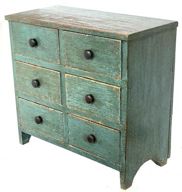 *SOLD* J298 Late 19th century Pennsylvania six drawer chest / apothecary in original blue painted surface. Half-moon cut out ends. All wire nail construction. Circa 1870�s. Measurements: 27� wide x 12 5/8� deep x 25� tall