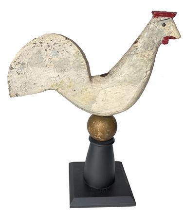 G537 19th Century  Folk Art Wooden Chicken Weathervane. A charming American Folk Art carved pine rooster weathervane with a wonderful silhouette with a large tail, all supported by an iron rod with a sphere halfway down. A newer wood block acts as a base to support the weathervane. Measurements are 22� tall 20� wide 
